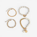 Chique set van 4 gouden armbanden – Slang, parels en schakels