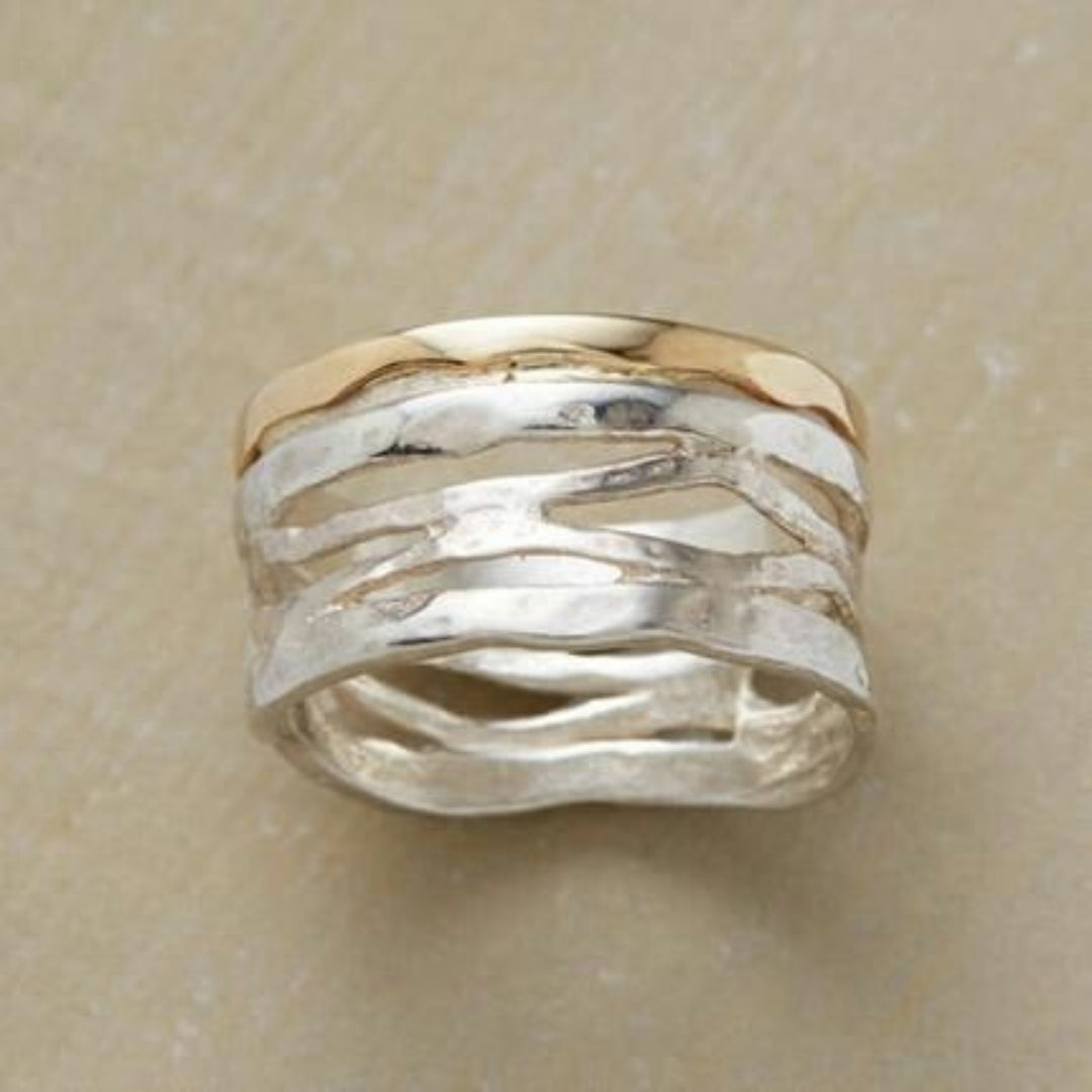 Vintage holle ring van goud en zilver
