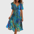 Joanne | Midi Chic Jurk