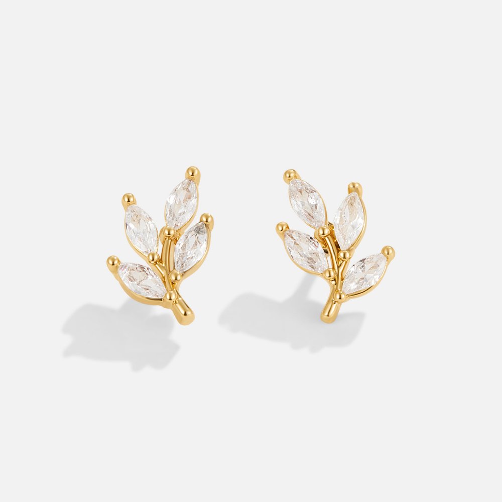 Zoé – Gouden oorbellen met bladdetail.