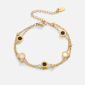 Armband van onyx en witte steen